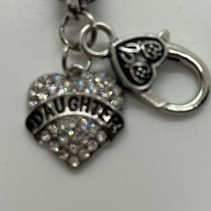 Daughter heart Silver toned beautiful charmed bracelet.